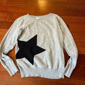 Woman’s star sweater